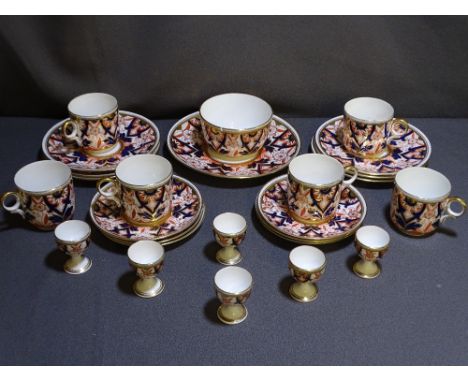 A TWENTY-SIX PIECE WILEMAN &amp; CO CROWN DERBY IMARI STYLE BREAKFAST SET