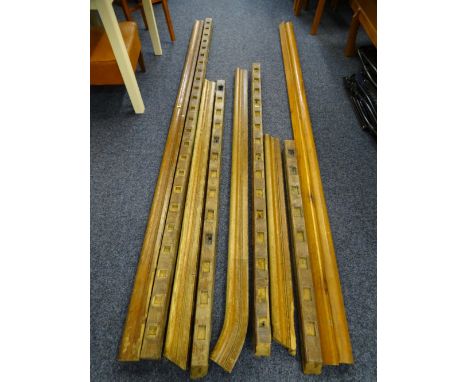 A GOOD QUANTITY OF VINTAGE OAK BANISTER RAIL AND BARLEY TWIST SPINDLES along with a vintage crop scythe