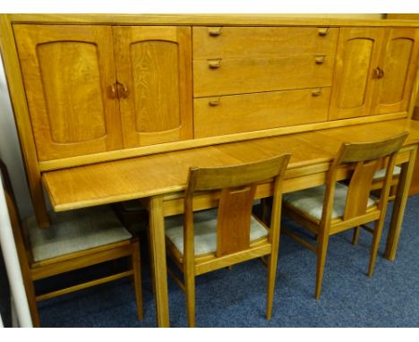 AN EXCELLENT VINTAGE NATHAN TEAK DINING ROOM SUITE of long sideboard, extending table and six chairs, 77cms height, 212cms le