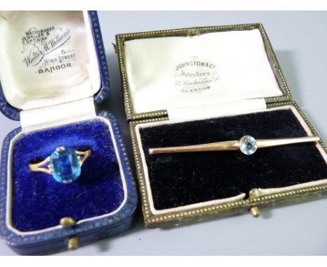 TWO ITEMS OF BLUE STONE SET GOLD JEWELLERY to include a possibly 22ct gold and facet cut topaz ring, size S, 3.4grms and a 9c