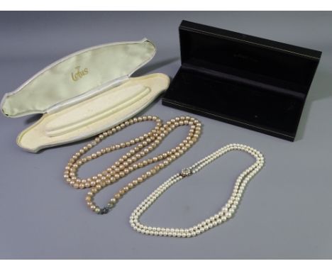 CASED TWIN ROW CULTURED PEARL NECKLACE OF GRADUATED BEADS with 9ct gold circular seed pearl centre clasp and a further non-gr