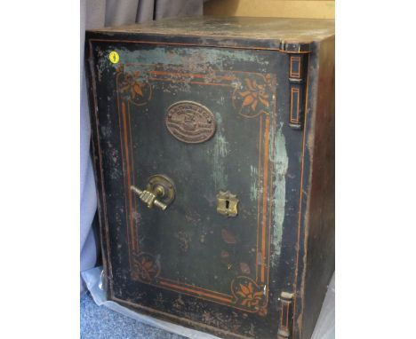 A VINTAGE S WITHERS &amp; CO CAST IRON SAFE WITH KEY, having painted detail and hand grip handle, 60cms height, 45.5cms width
