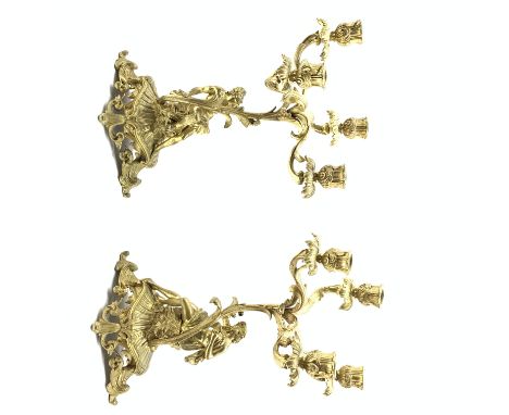 Pair of ormolu four light candelabra with foliate branches supported by classical male and female figures on pierced oval roc