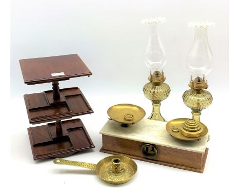 Walnut cased balance scales with marble top and various weights, pair of moulded glass oil lamps with glass chimneys, brass c
