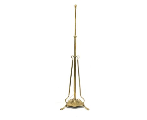 Early 20th century Art Nouveau style brass standard lamp, reeded and scrolled decoration, on tripod base, H159cm Condition Re