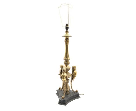 Empire design gilt brass table lamp with three cherubs above a triangular platform base H66cm excluding fitting Condition Rep