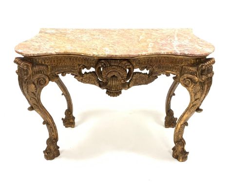 20th century French Louis XV style giltwood console table, with red marble serpentine top, with ornate carved frieze, apron a