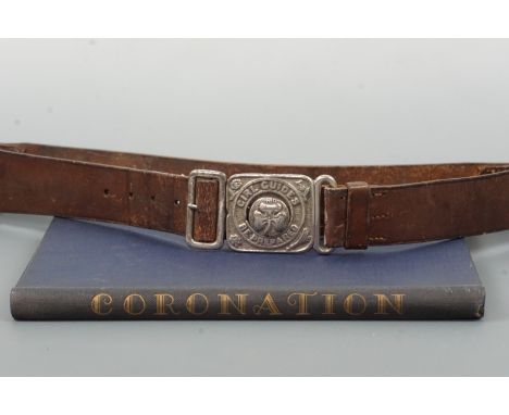 A vintage Girl Guides belt and whistle, together with J A C Roberts' 1953 "Coronation", published for the Girl Guides Associa