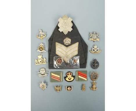 Sundry cap and other badges including a Great War Women's Army Auxiliary Corps badge