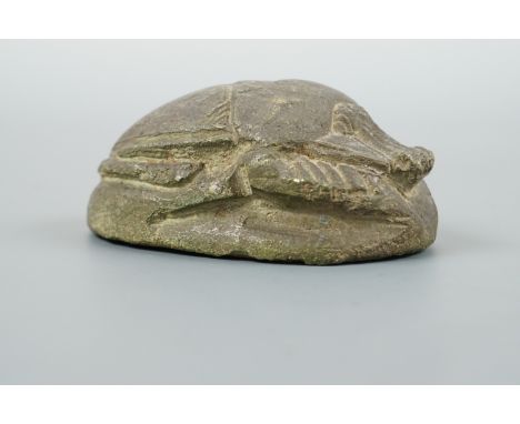 An Egyptian green ceramic scarab, 7.5 cm