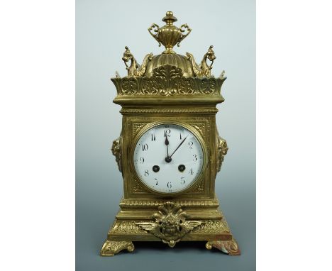 A late 19th Century French flamboyant brass-cased mantle clock, 37 cm high