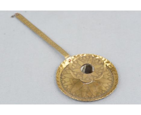 A brass chamber stick