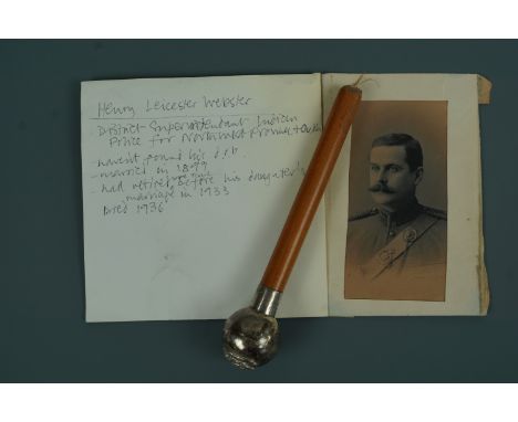 A Victorian North West Provinces and Oudh Police Force silver swagger stick pommel, the collar engraved "H L W from A T W" an