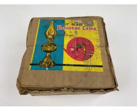 A seventeen inch glass kerosene lamp in original packaging
