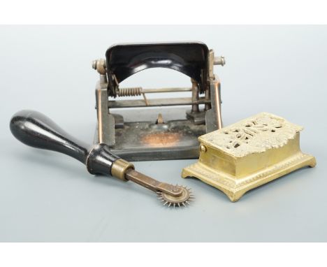 A vintage East-Light anodised office hole punch together with a parchment roller and an Art Nouveau brass stamp box