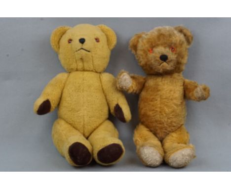 A vintage musical Teddy bear, 40 cm high, and one other similar Teddy bear