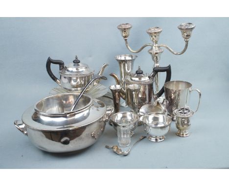 A quantity of electroplate including candelabra, four piece tea set, cream jug (a/f), gallery tray, ladle etc.