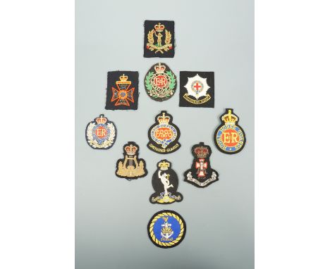 A quantity of army blazer and other military cloth badges