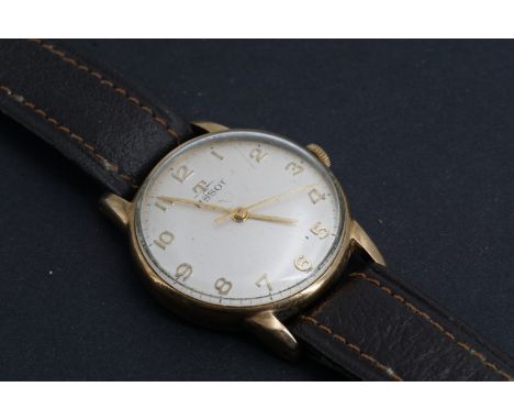 A 1960s Tissot 9ct gold wrist watch, having a 17 jewel calibre 781 manual movement, the frosted circular convex face having g