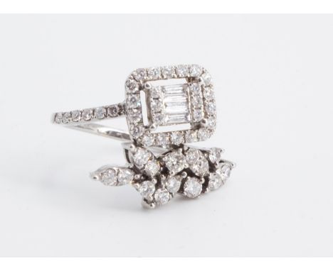 A highly individual contemporary diamond engagement or dress ring, comprising a refined twist-set combination of organic asym