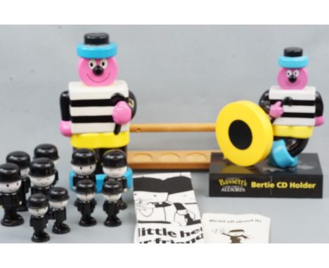 A Bassett's CD holder and money box together with Home Pride figures etc.