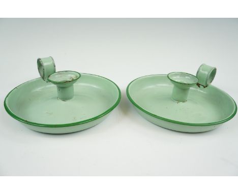 Two vintage enamel chamber sticks