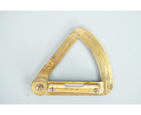 An early 19th Century brass clinometer by the Cornish mining instrument maker William Wilton of St Day, 8.5 cm