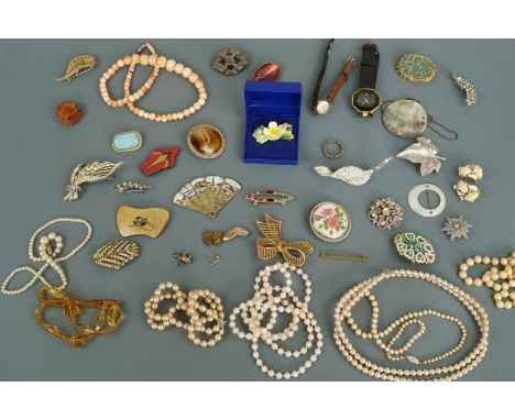 A quantity of vintage costume jewellery and watches including a Victorian white metal lozenge-shaped brooch, Art Deco painted