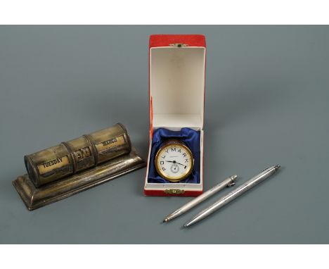 An electroplate perpetual desk calendar, circa 1930s, together with two engine-turned ball-point pens, one stamped "Sterling 