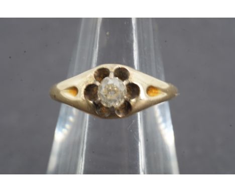 A vintage .25ct diamond solitaire ring, the old cut diamond being set to the centre of a flower-head shaped claw setting, sha