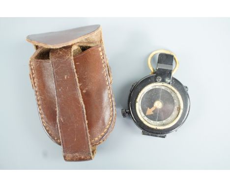 A Verner's patent prismatic marching compass in leather case