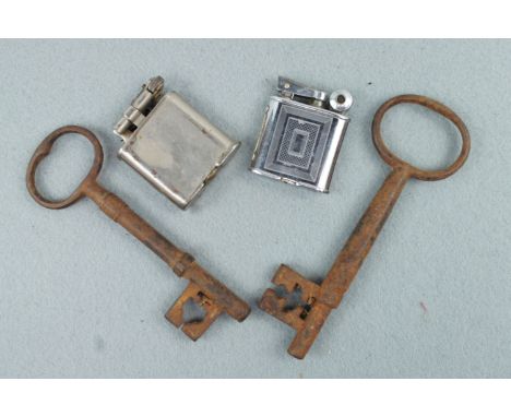 Two vintage keys and two lighters