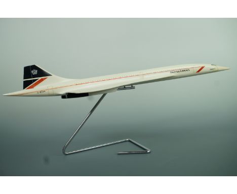 A 1970s scale model British Airways Concorde aircraft, in plastic-coated metal, 1:100 scale (63 cm), in BA livery with regist