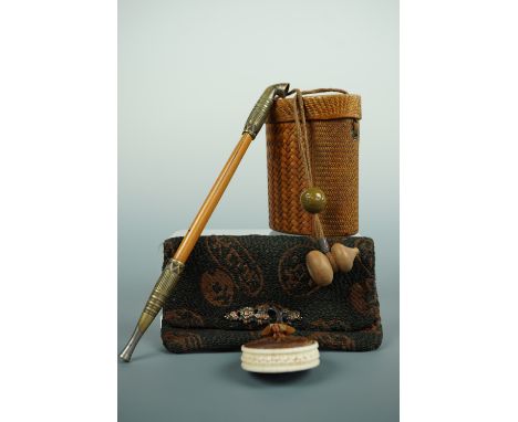 Meiji - Taisho Japanese personal accoutrements comprising a tabako-ire suspended from a manju netsuke, the later having an in