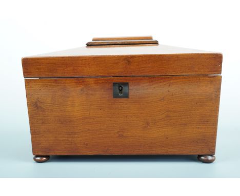 A late Georgian mahogany sarcophagus form two-compartment tea caddy, 23 cm x 15 cm x 13 cm high