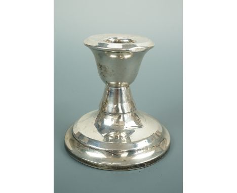 A George V silver diminutive candle stick, with inverted bell-form socket and stepped circular foot, S Blanckensee, Birmingha