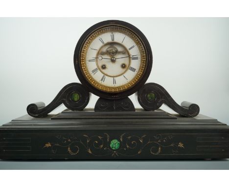 A large late 19th Century French malachite-inlaid polished black slate drum-head mantle clock