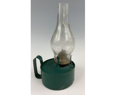 A finger oil lamp, 27 cm high