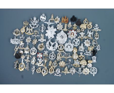 A large quantity of British army Staybrite and other cap badges etc