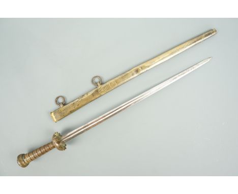 A Georgian Naval dirk, having a slender tapering double-edge blade with central fuller, the gilt brass hilt comprising a band