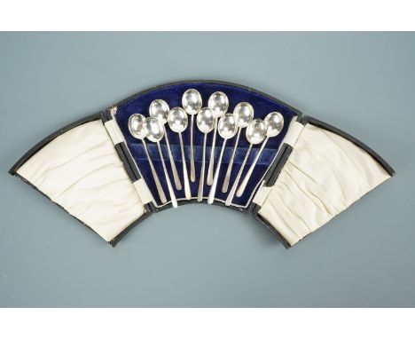 Eleven George V silver coffee spoons of moderne design, six presented in a fitted case, T. Wilkinson &amp; Sons, Birmingham, 