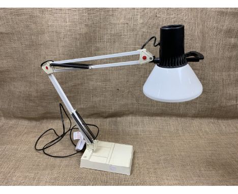 A contemporary Anglepoise lamp