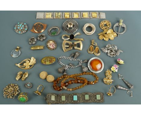 A quantity of vintage costume jewellery including a 1920s faceted amber glass bead necklace, marcassite floral brooch and ear
