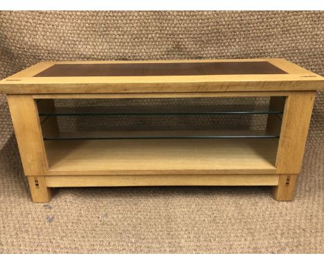 A contemporary light oak coffee table, 110 x 40 x 51 cm