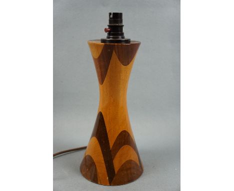 A 1950s - 1960s laminate wooden table lamp of opposed truncated conical form, 34 cm