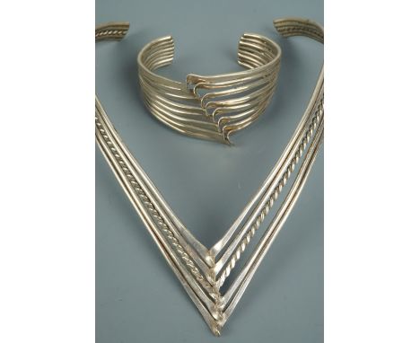 An Italian silver flexible bracelet together with a 1980s Mexican modernist collar necklace and bangle