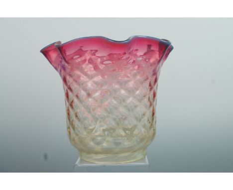 A Victorian vaseline glass oil lamp shade, of diaper-moulded bellflower form exhibiting pink and green hues, 16 cm x 19 cm, 1