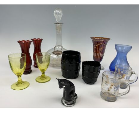 An etched ruby glass vase, 17 cm high, a spirit decanter, two amber glasses etc.