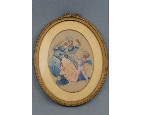 A 1920s embroidered silk-work and painted depiction of a lady holding Cupid's bow and arrow, in a Regency style oval gilt fra