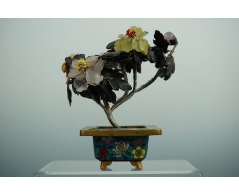 A Chinese carved jade and mineral shrub in a cloisonne pot, 11.5 cm